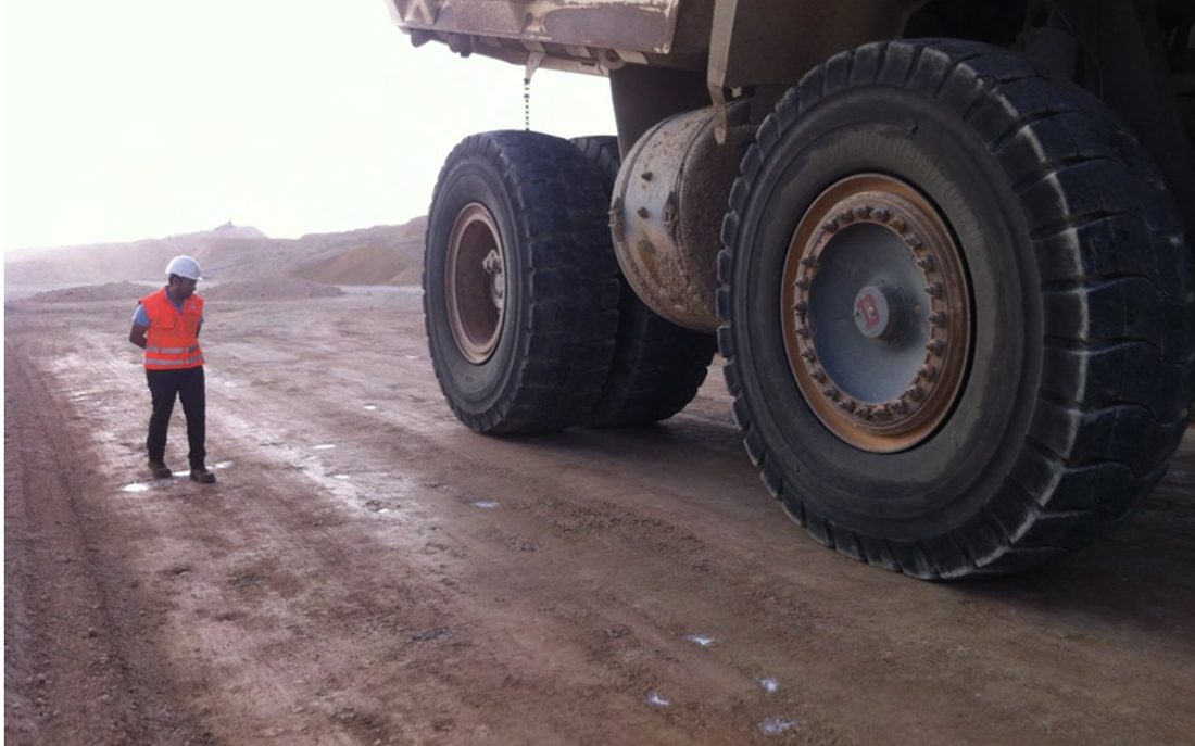 Heavy haul truck tires on a mine road